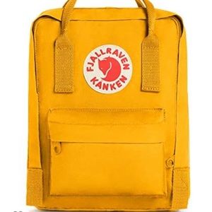 Mini fjallraven backpack in the warm yellow color